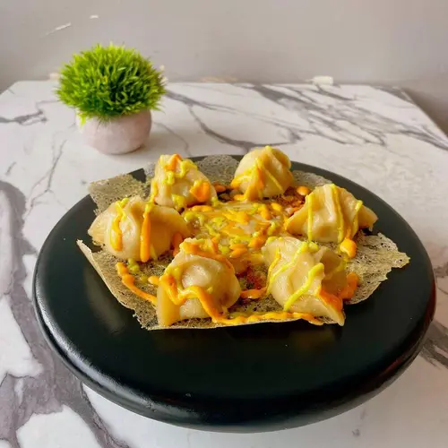 Pork & Cabbage Pizza Dumplings